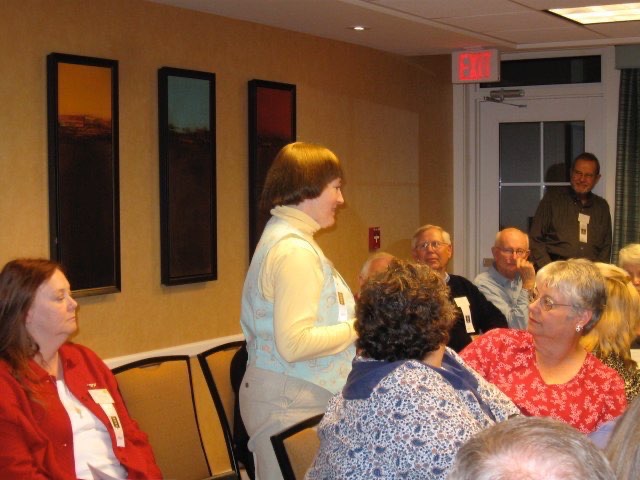 Marily Cummings and husband on left